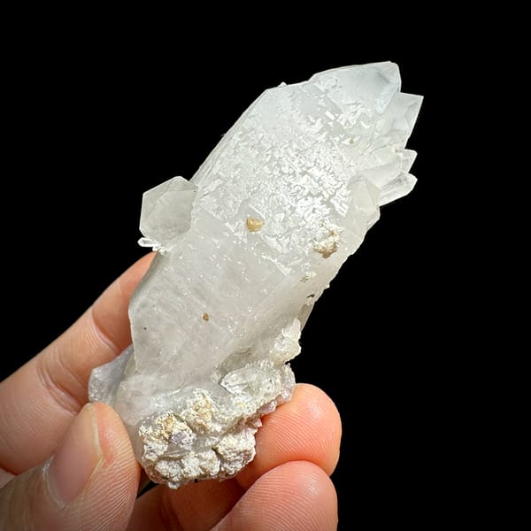Large frosted quartz crystal with purple-cored fluorite from Yaogangxian Mine, Hunan, China, close-up of the crystal faces