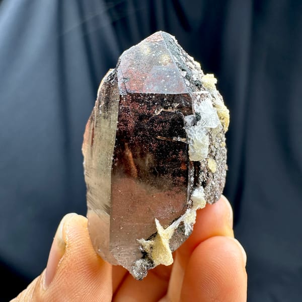 Red-skinned smoky quartz crystal with cream calcite from Yunxiao, Fujian, China, reverse side