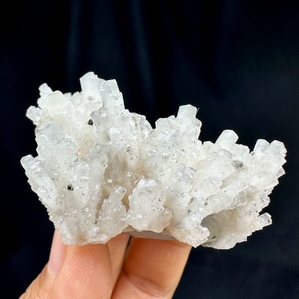 Feather calcite with pyrite, from Shangbao Mine, Hunan, China, close-up of the crystal faces