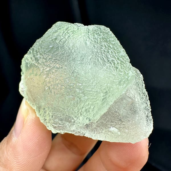 Pale green stepped fluorite with frosted skin from Guangdong, China, reverse side