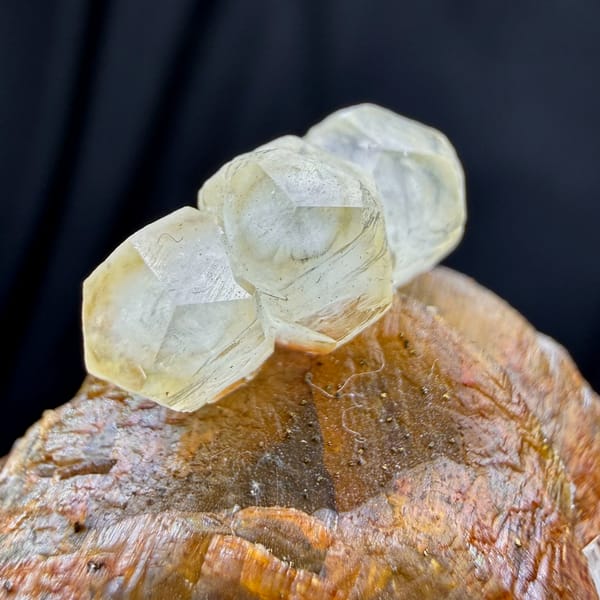 Golden-brown siderite block with pale calcite from Guizhou, China, reverse side