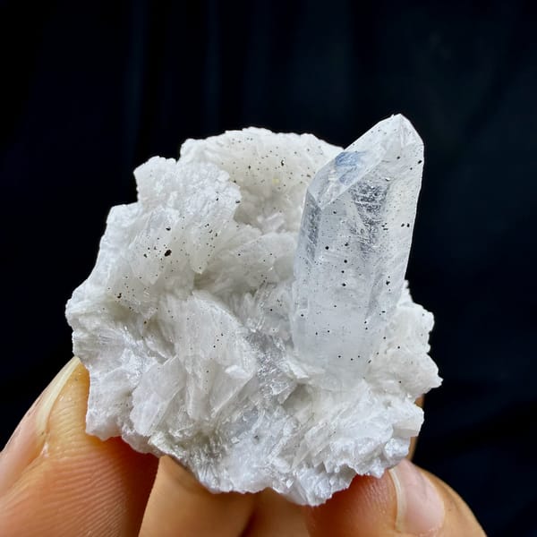Clear quartz point on cream dolomite with pyrite from Guizhou, China, second angle