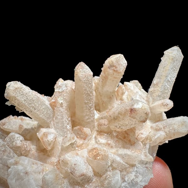 Spiky cluster of pale quartz needles with pyrite from Inner Mongolia, China, close-up of the crystal faces