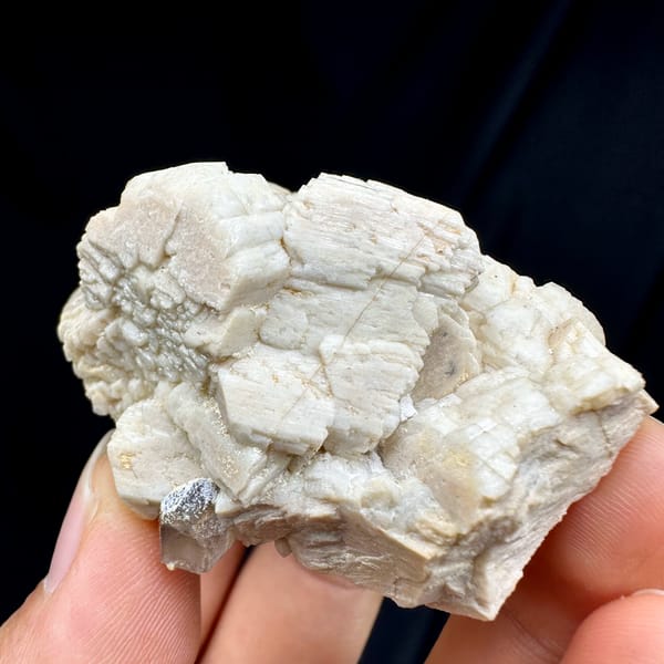 Blocky cream feldspar crystals with small quartz from Yunxiao, Fujian, China, reverse side