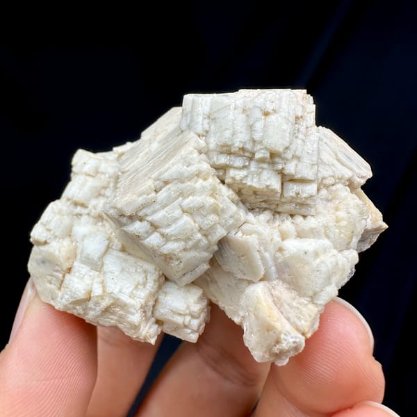 Blocky cream feldspar crystals with small quartz from Yunxiao, Fujian, China, top view