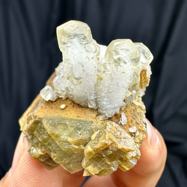Frosted white calcite prisms on golden siderite block from Guizhou, China, second angle