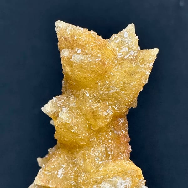 Golden double-terminated calcite branch from Guizhou, China, second angle
