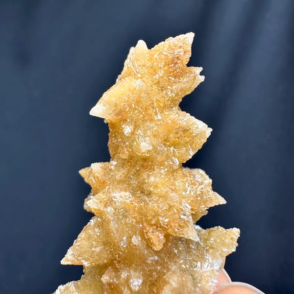 Golden double-terminated calcite branch from Guizhou, China, reverse side