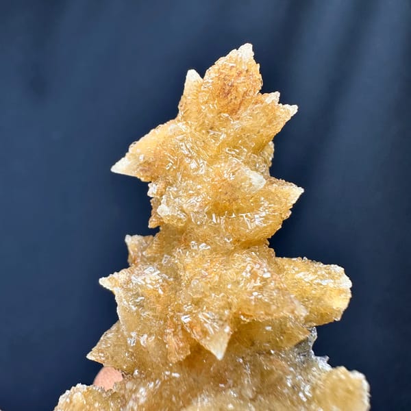 Golden double-terminated calcite branch from Guizhou, China, top view