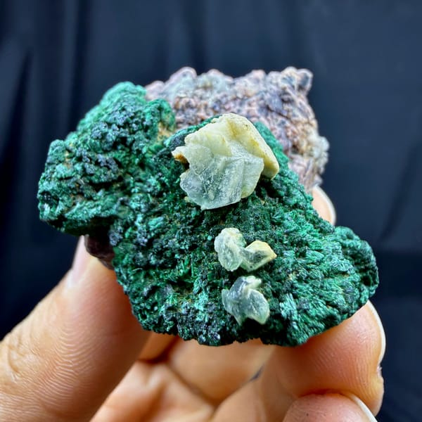 Deep green malachite crust with calcite and cobaltoan calcite from DR Congo, reverse side