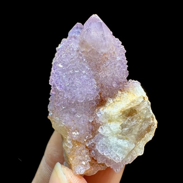 Lilac cactus quartz crystal on small matrix from South Africa, close-up of the crystal faces