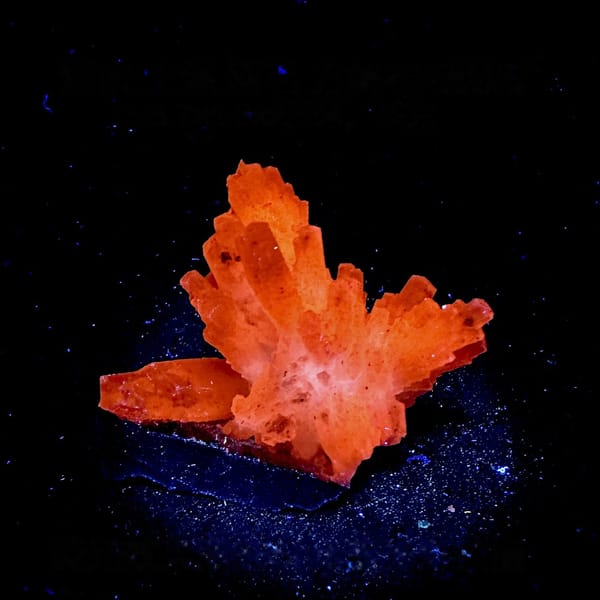 Feather calcite spray, from Shangbao Mine, Hunan, China, detail of the matrix contact