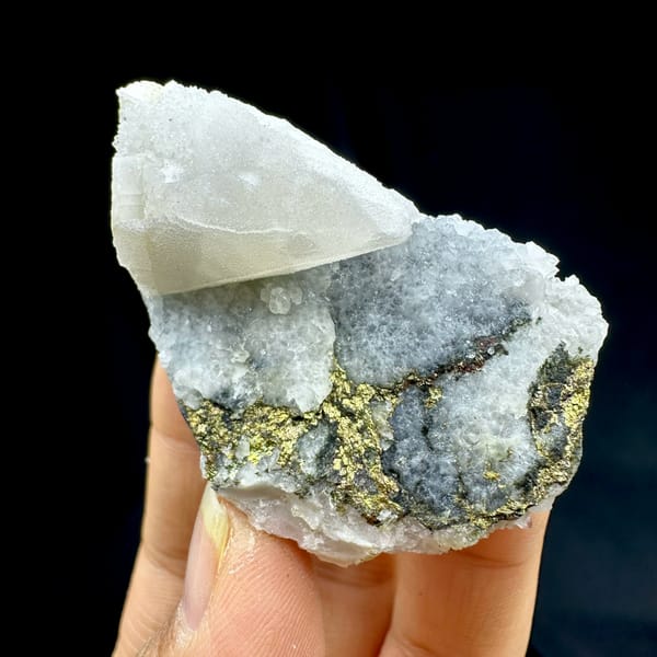 Sugar calcite with chalcopyrite, from Hunan, China, close-up of the crystal faces