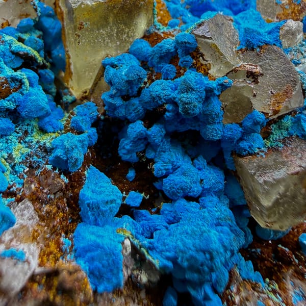 Blue chrysocolla with fluorite cubes from DR Congo — detail view