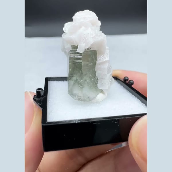 Green quartz crystal capped with white dolomite — complete view
