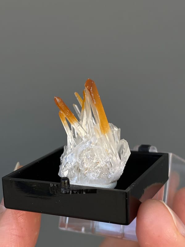 Amber quartz points rising from a white crystal base, Jinkouhe, Sichuan, China