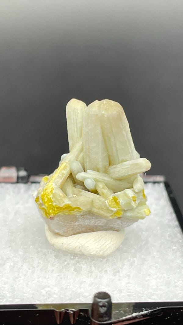 Cream-green plumbogummite prisms with yellow at the base, Guangxi, China