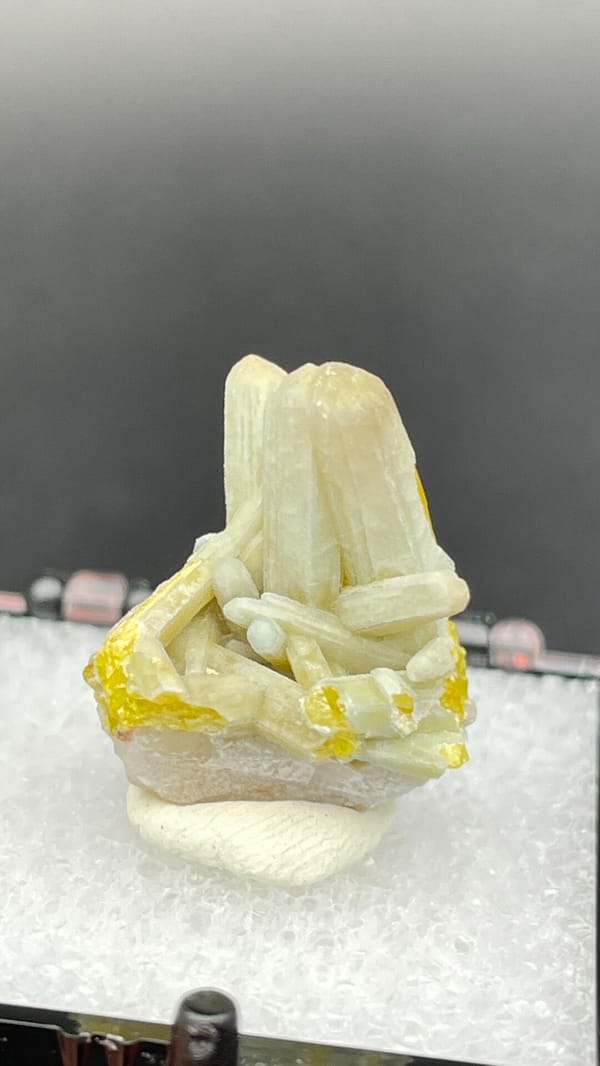 Cream-green plumbogummite prisms with yellow at the base, Guangxi, China, second angle
