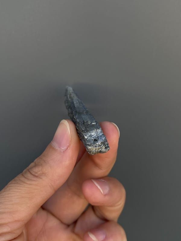 Steel blue-grey bladed kyanite crystal from Madagascar, top view