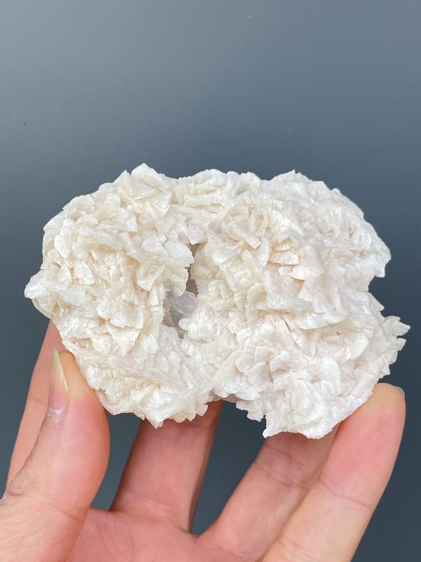 Plate covered in white platy dolomite rosettes from Hunan, China, second angle