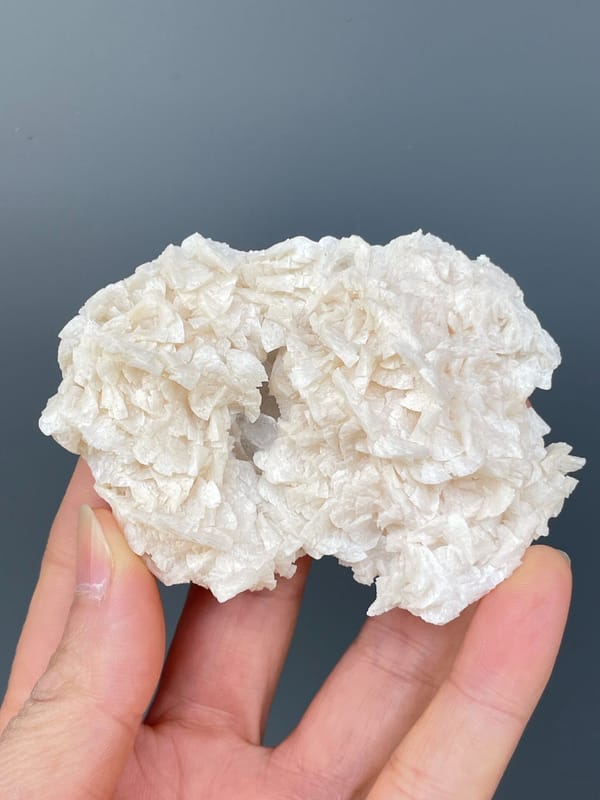 Plate covered in white platy dolomite rosettes from Hunan, China, top view