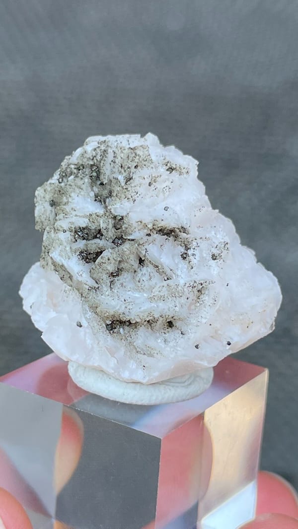 White dolomite crystal rosette with dark pyrite from Hunan, China, second angle