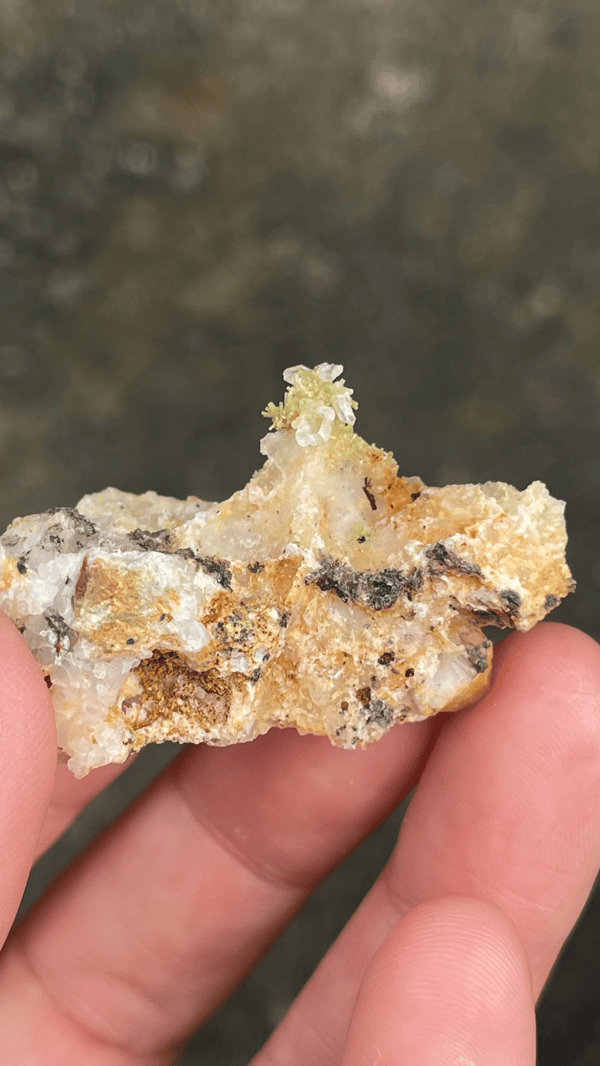 Pale cerussite plate with a tuft of green pyromorphite from Guangdong, China