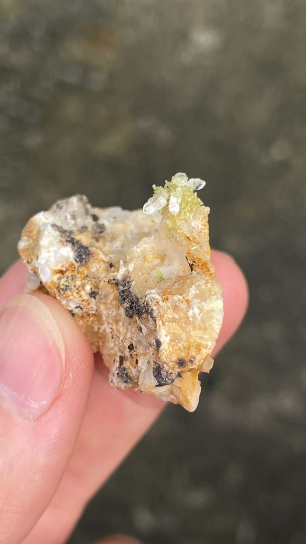 Pale cerussite plate with a tuft of green pyromorphite from Guangdong, China, second angle