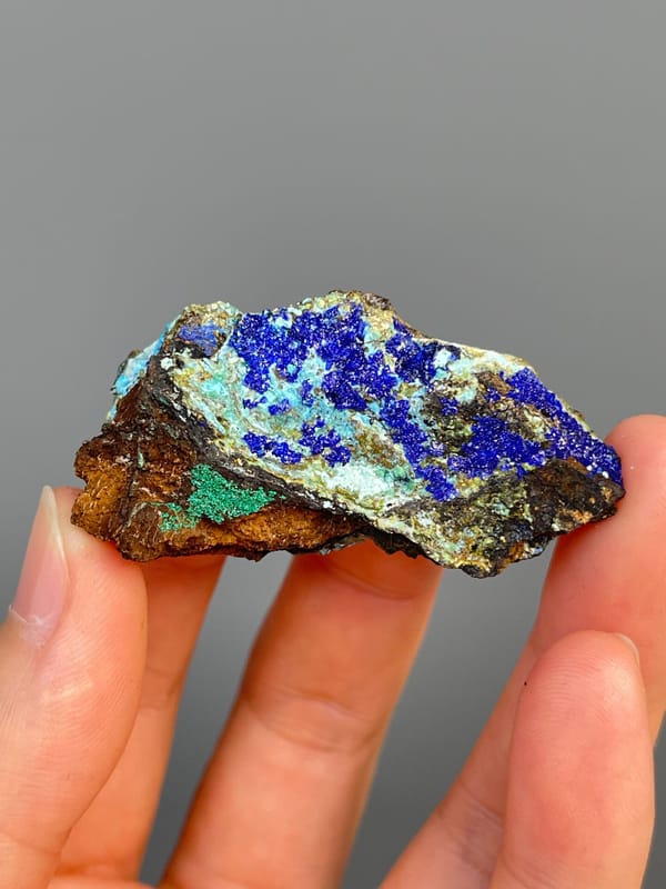 Electric blue azurite with green staining and pale gibbsite, Yunnan, China