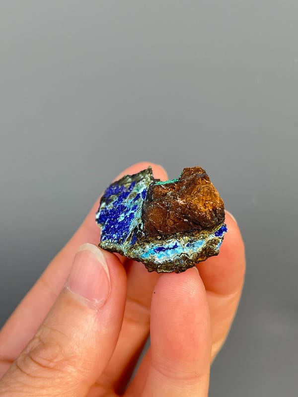 Electric blue azurite with green staining and pale gibbsite, Yunnan, China, top view