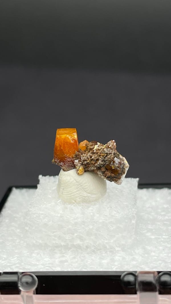 Orange tabular wulfenite with green mottramite from Ojuela Mine, Durango, Mexico, close-up of the crystal faces