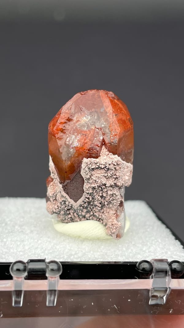 Deep red hematoid quartz crystal with frosted base from Shanxi, China, in a box, reverse side