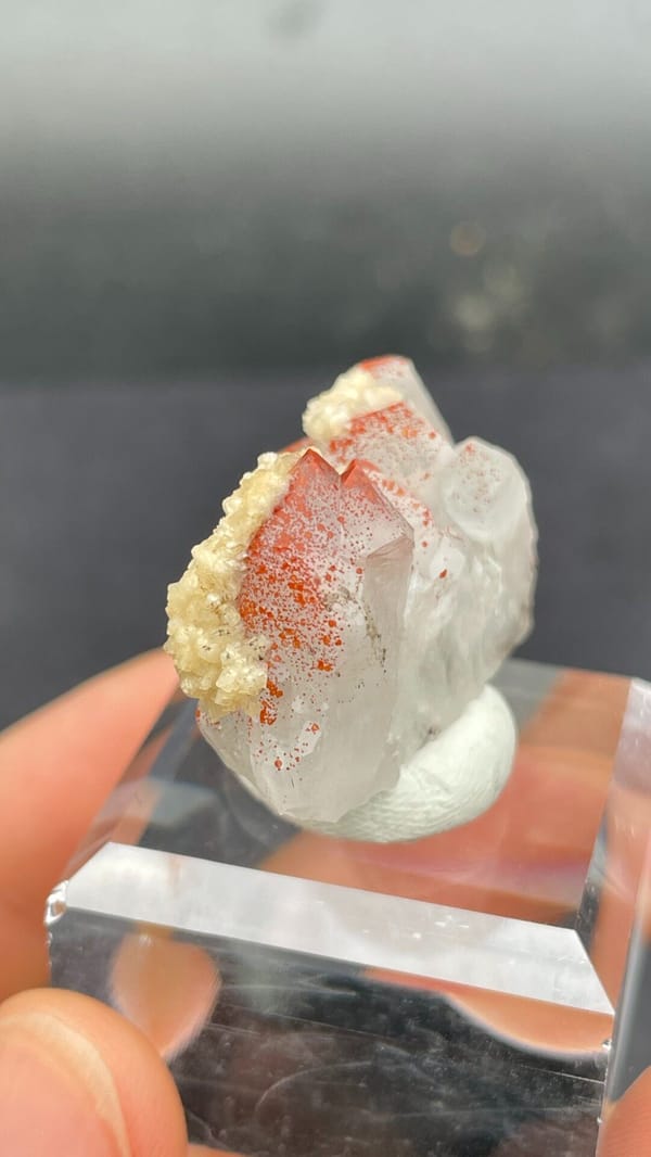 Red-spotted quartz with cream dolomite and brassy pyrite from Jiangxi, China, close-up of the crystal faces