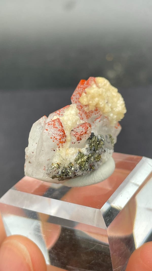 Red-spotted quartz with cream dolomite and brassy pyrite from Jiangxi, China, top view