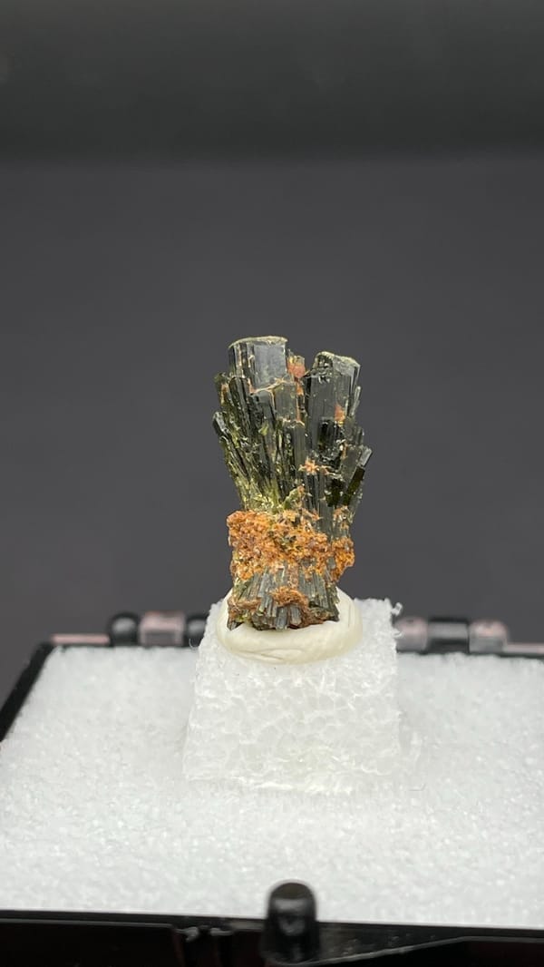 Small fan of olive-green epidote blades on orange base, Handan, Hebei, China