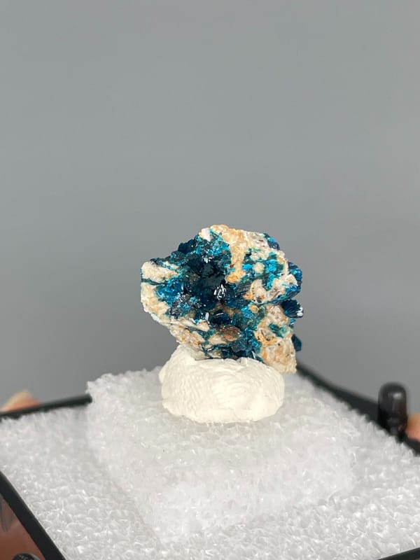 Narrow rock column capped with deep blue veszelyite, Yunnan, China, detail of the matrix contact