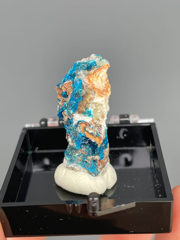 Tall piece with blue veszelyite and orange banding from Yunnan, China, second angle
