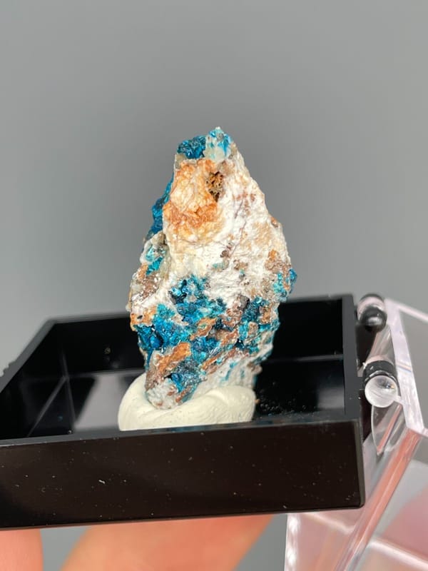 Tall piece with blue veszelyite and orange banding from Yunnan, China, top view