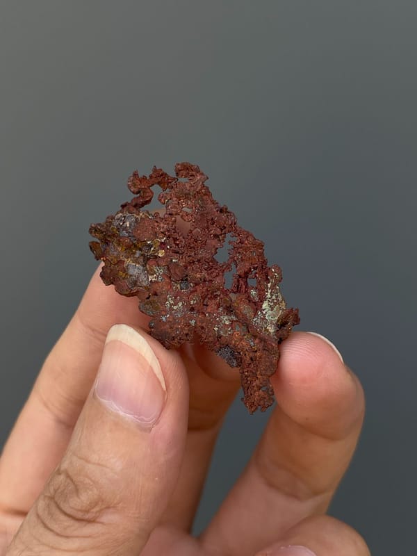 Lacy branching native copper sheet from Hubei, China, detail of the matrix contact