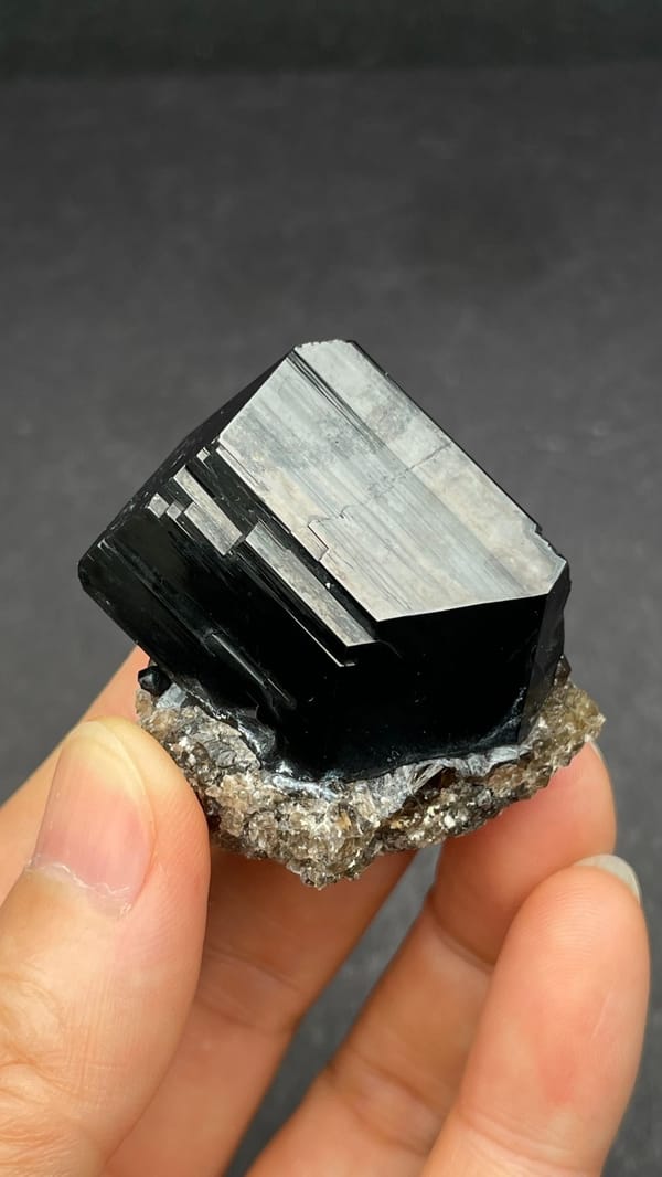 Black schorl tourmaline with three-faced termination on matrix, Namibia