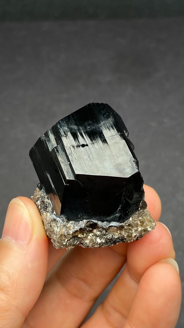 Black schorl tourmaline with three-faced termination on matrix, Namibia, second angle