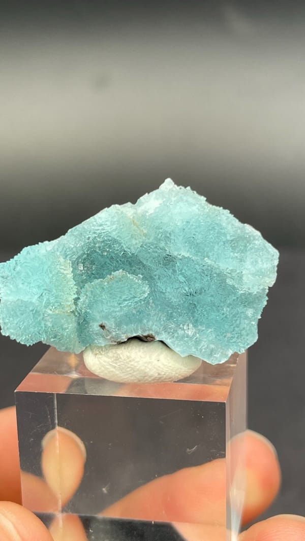 Turquoise botryoidal hemimorphite crust from Guangdong, China, close-up of the crystal faces