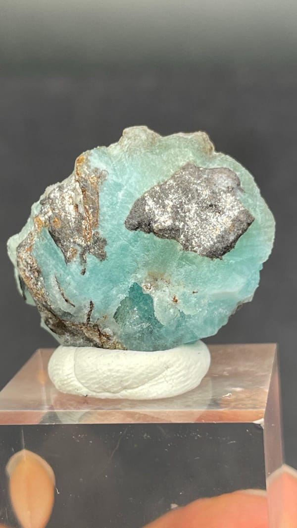 Mint-turquoise botryoidal hemimorphite around a hollow, Guangdong, China, close-up of the crystal faces