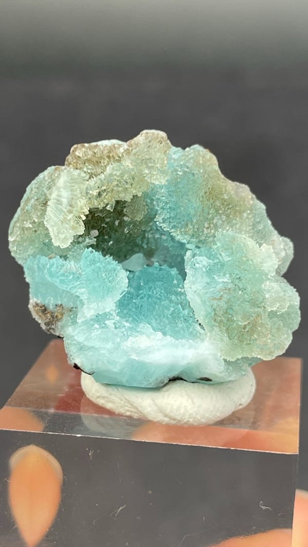 Mint-turquoise botryoidal hemimorphite around a hollow, Guangdong, China, top view