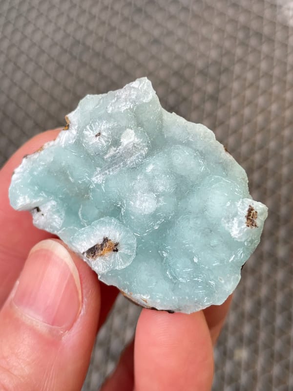 Pale mint-green botryoidal hemimorphite crust from Yunnan, China, reverse side
