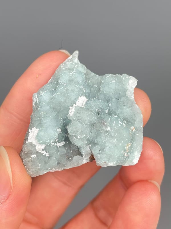 Pale mint-green botryoidal hemimorphite crust from Yunnan, China, reverse side
