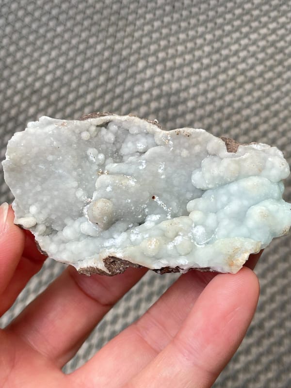 Pale blue-green botryoidal hemimorphite plate from Yunnan, China, reverse side