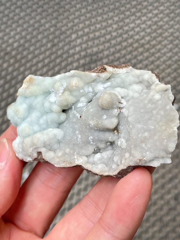 Pale blue-green botryoidal hemimorphite plate from Yunnan, China, top view