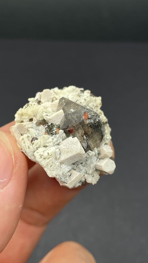 Smoky quartz crystal in cream feldspar from Yunxiao, Fujian, China, second angle