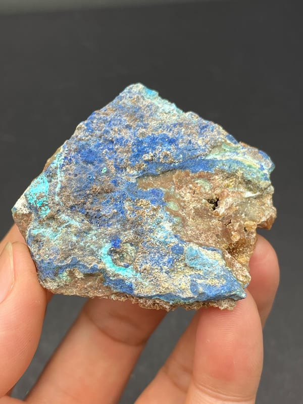 Deep blue azurite crust spread across a rock slab from Yunnan, China, second angle